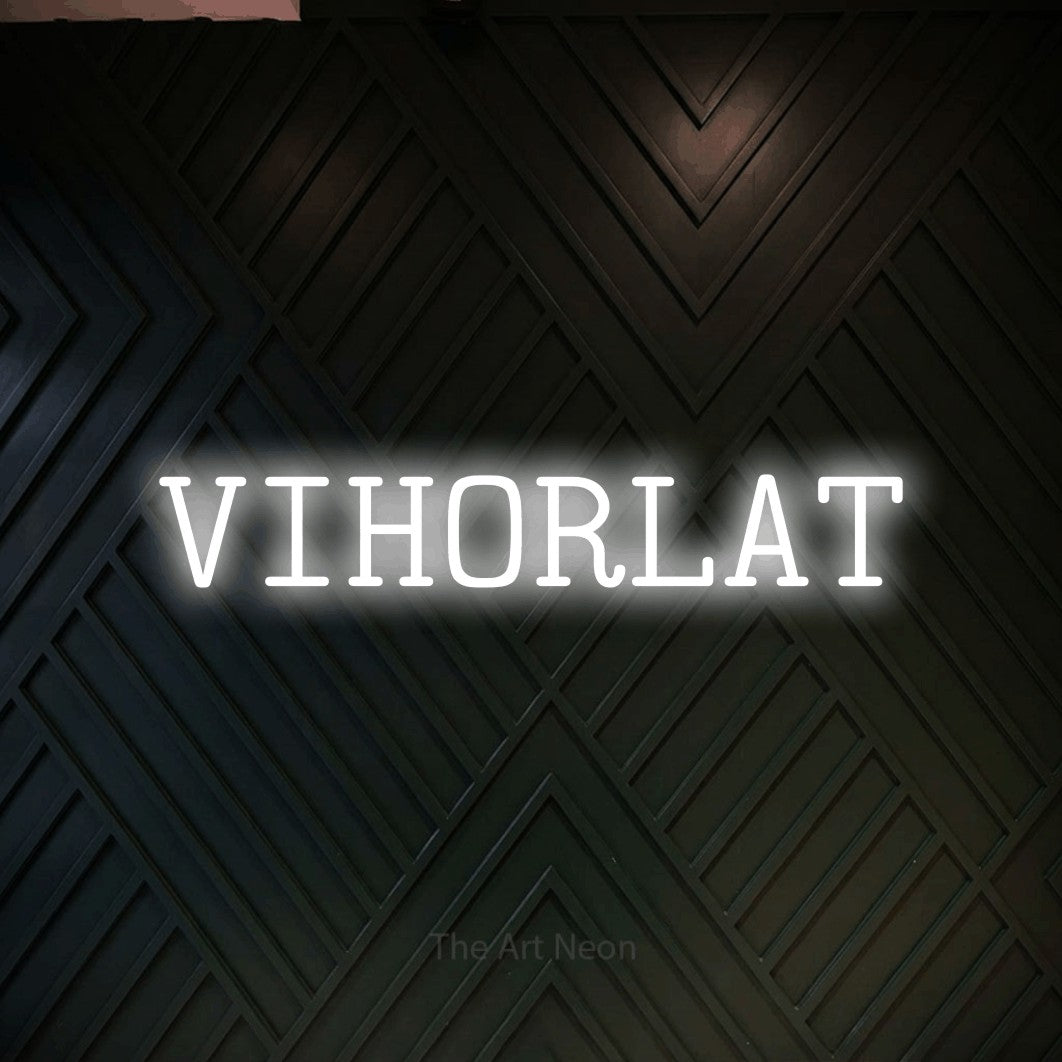 LED neon sign reading “VIHORLAT”, arranged in a single line.