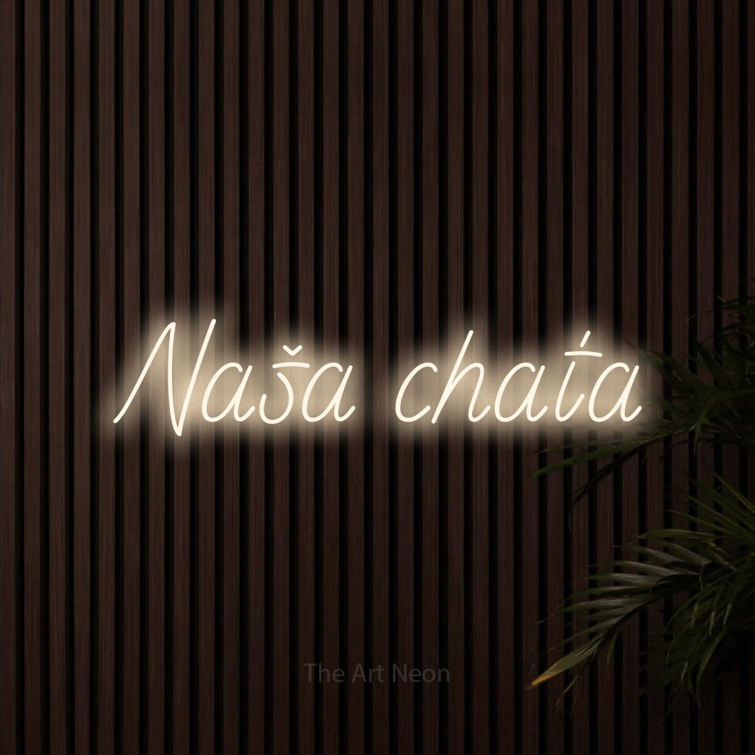LED neon sign reading “Naša chata”, arranged in a single line.