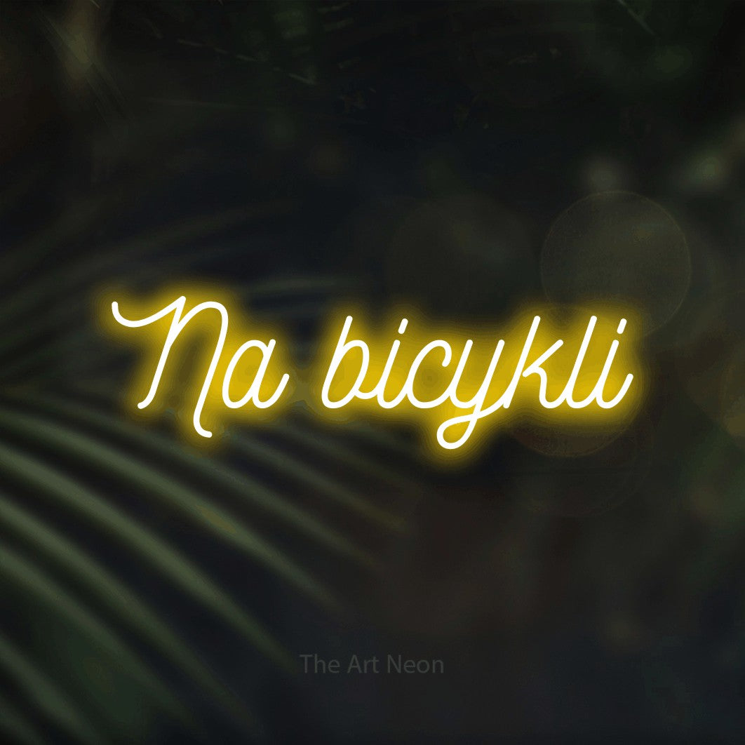 LED neon sign reading “Na bicykli”, arranged in a single line.