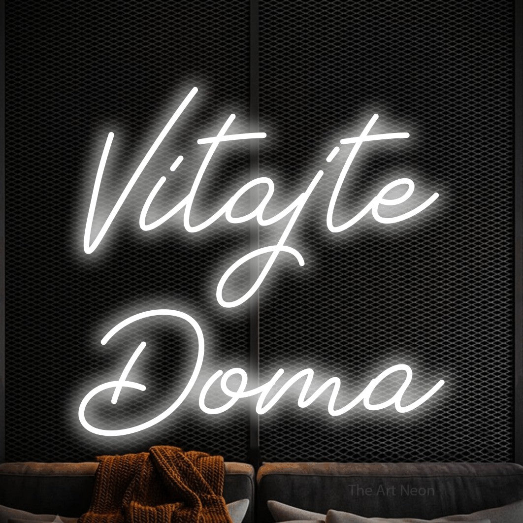 LED neon sign reading “Vitajte Doma”, arranged in two lines.