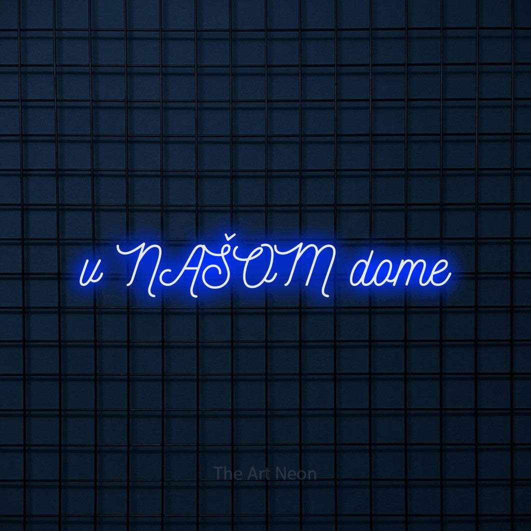 LED neon sign reading “v NAŠOM dome”, arranged in a single line.