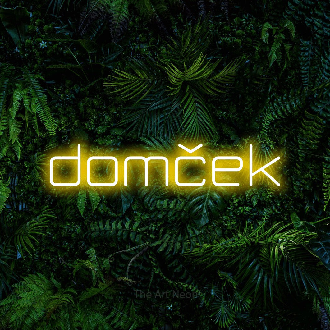 LED neon sign reading “domček”, arranged in a single line.