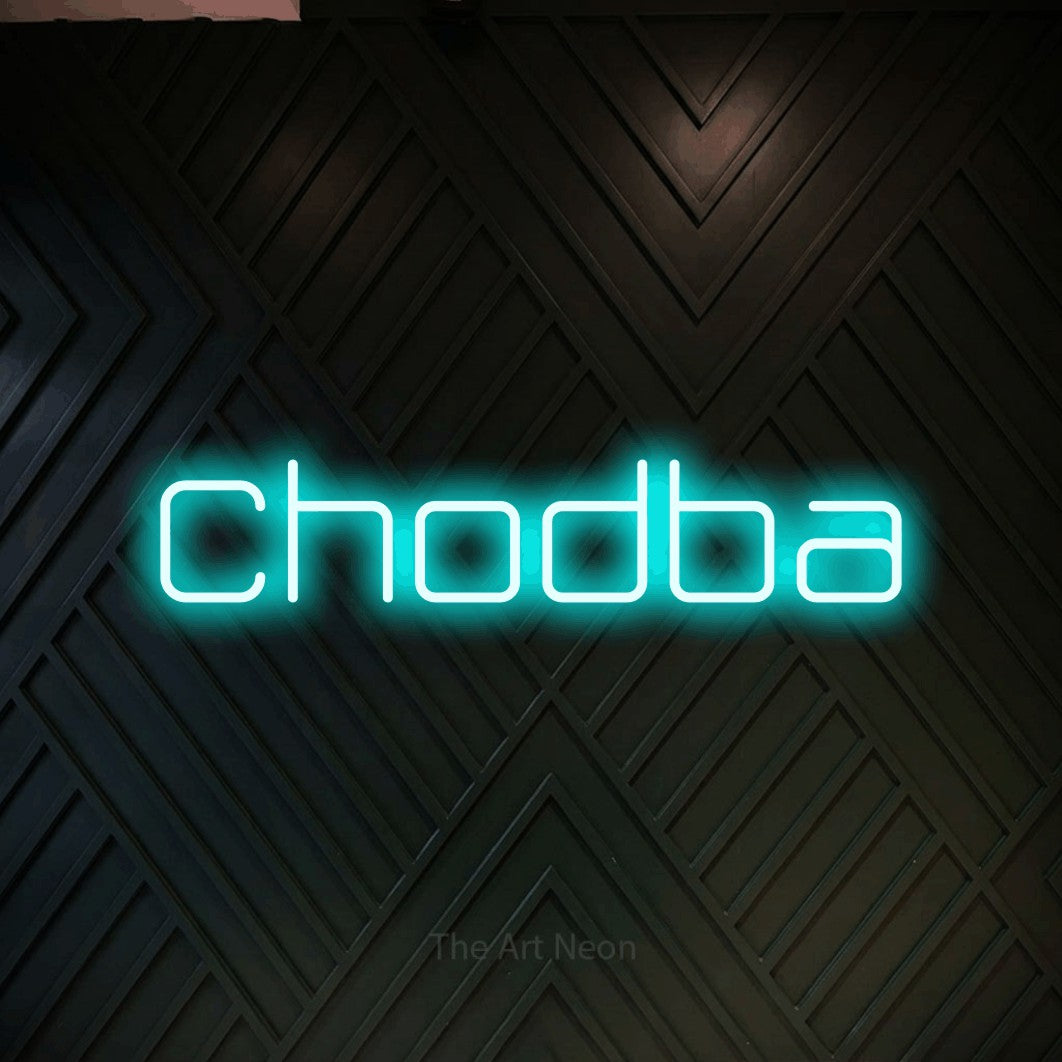 LED neon sign reading “Chodba”, arranged in a single line.