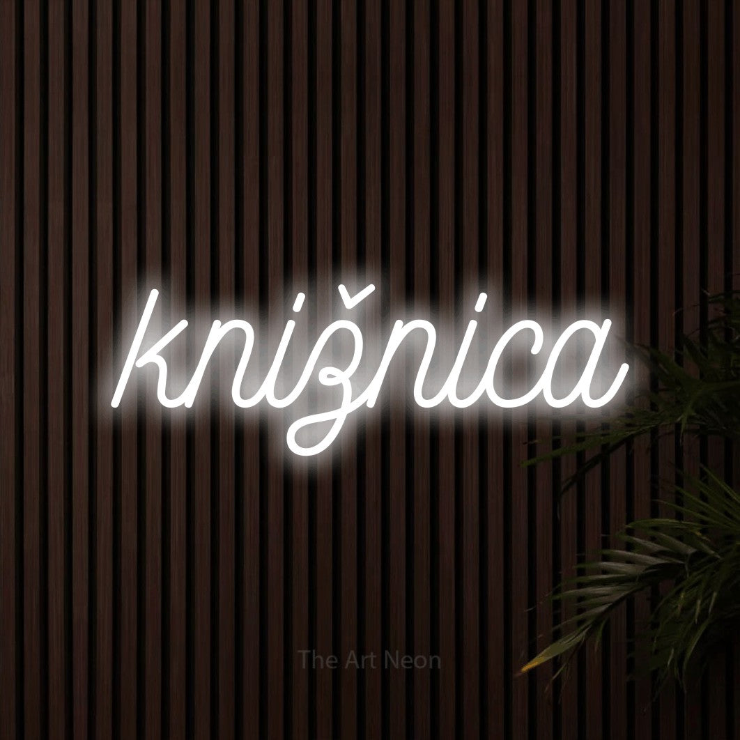 LED neon sign reading “knižnica”, arranged in a single line.