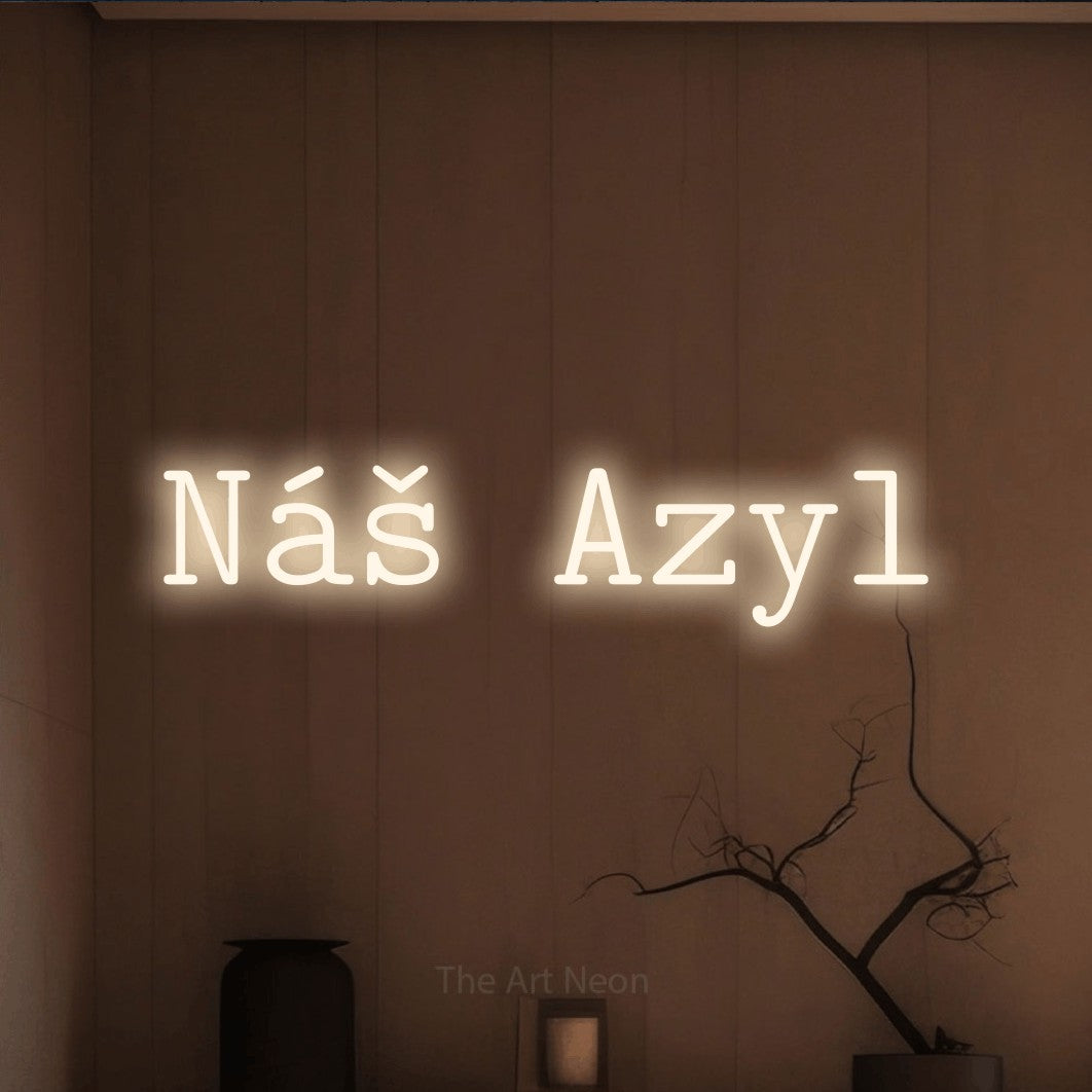 LED neon sign reading “Náš Azyl”, arranged in a single line.