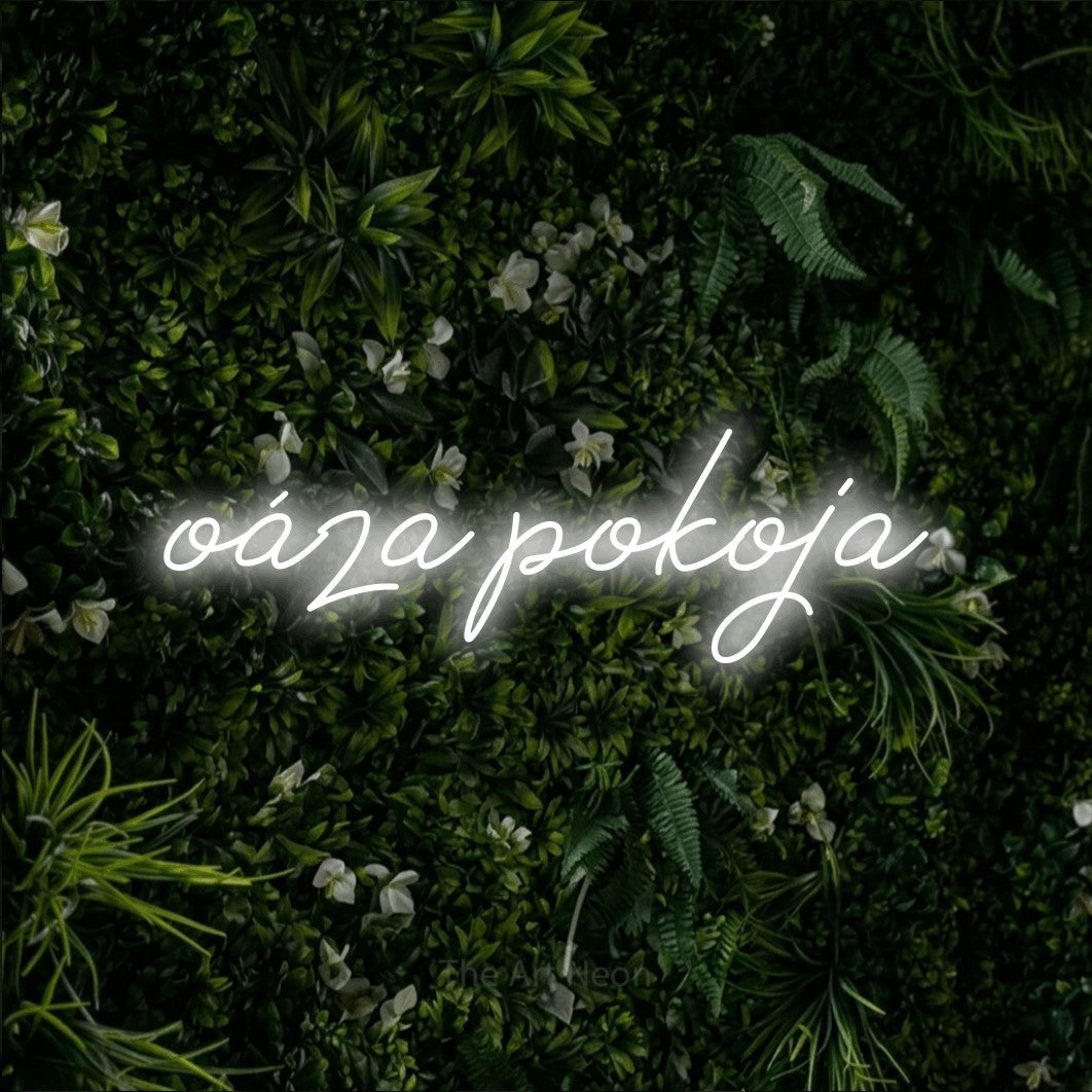 LED neon sign reading “oáza pokoja”, arranged in a single line.