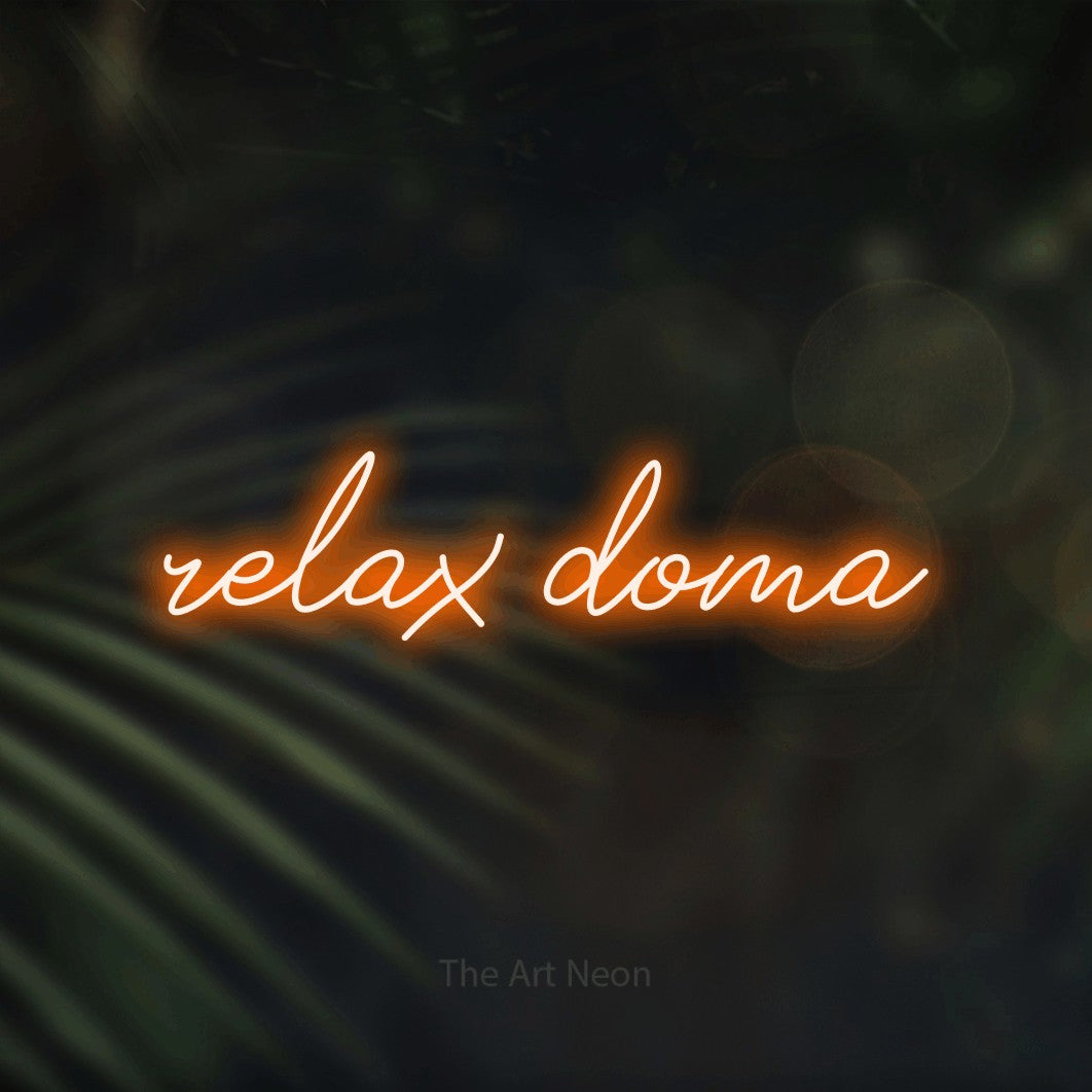 LED neon sign reading “relax doma”, arranged in a single line.