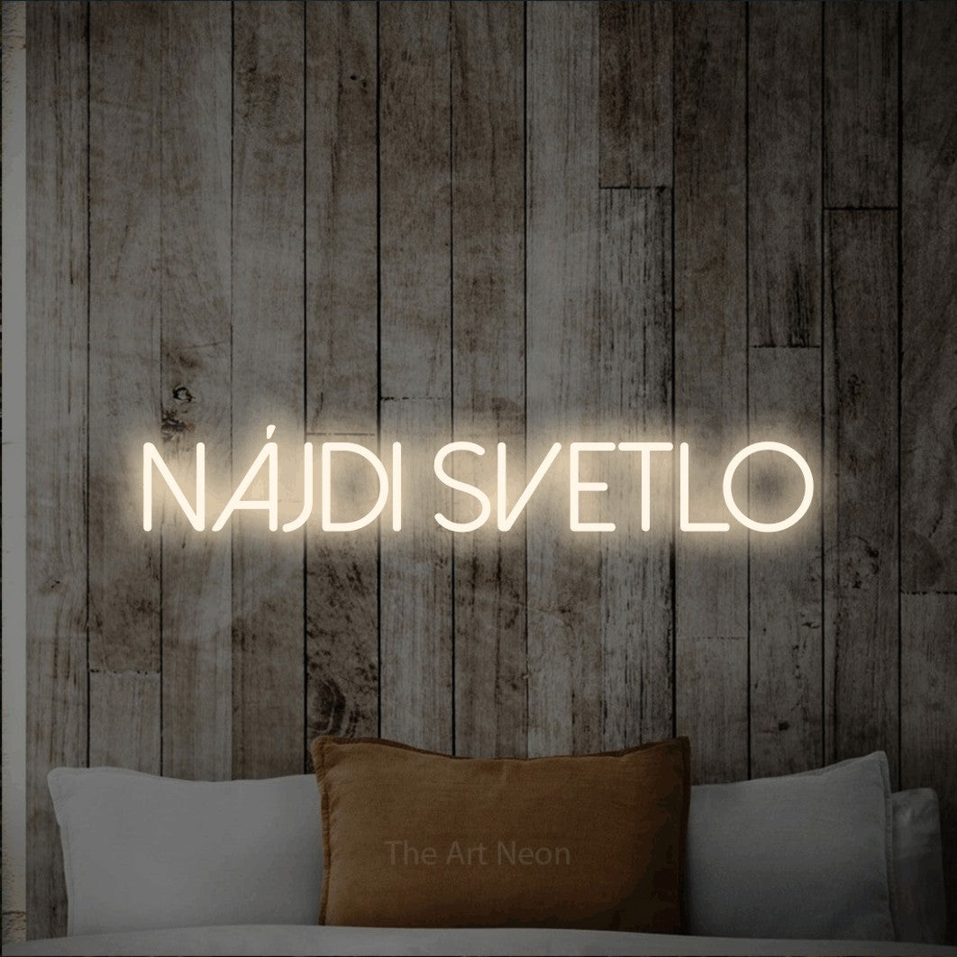 LED neon sign reading “NÁJDI SVETLO”, arranged in a single line.