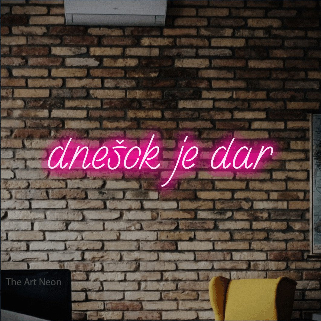 LED neon sign reading “dnešok je dar”, arranged in a single line.