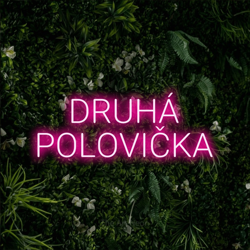 LED neon sign reading “DRUHÁ POLOVIČKA”, arranged in two lines.