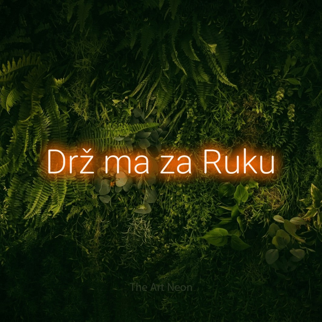 LED neon sign reading “Drž ma za Ruku”, arranged in a single line.