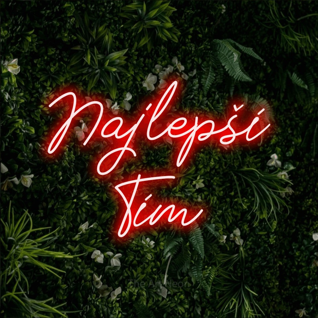 LED neon sign reading “Najlepší Tím”, arranged in two lines.