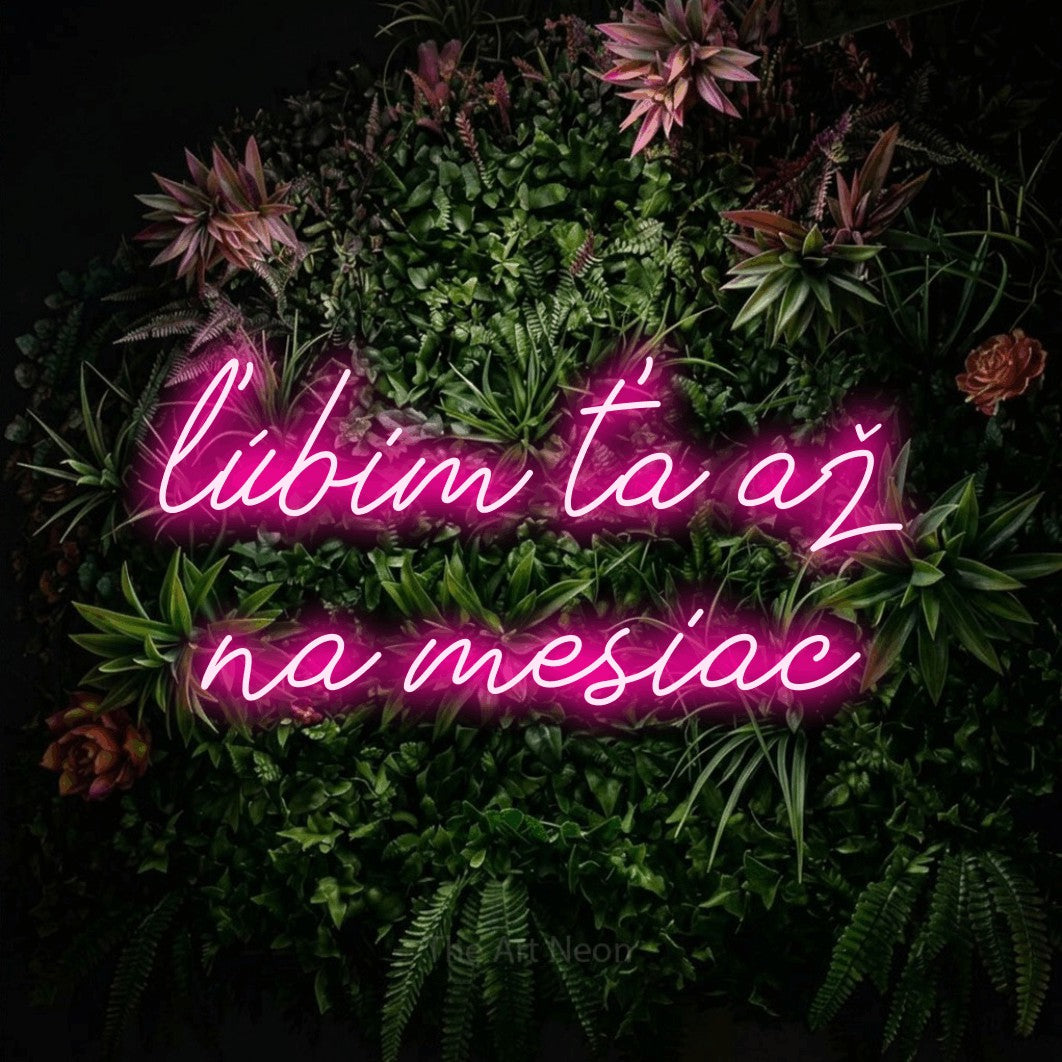 LED neon sign reading “ľúbim ťa až na mesiac”, arranged in two lines.