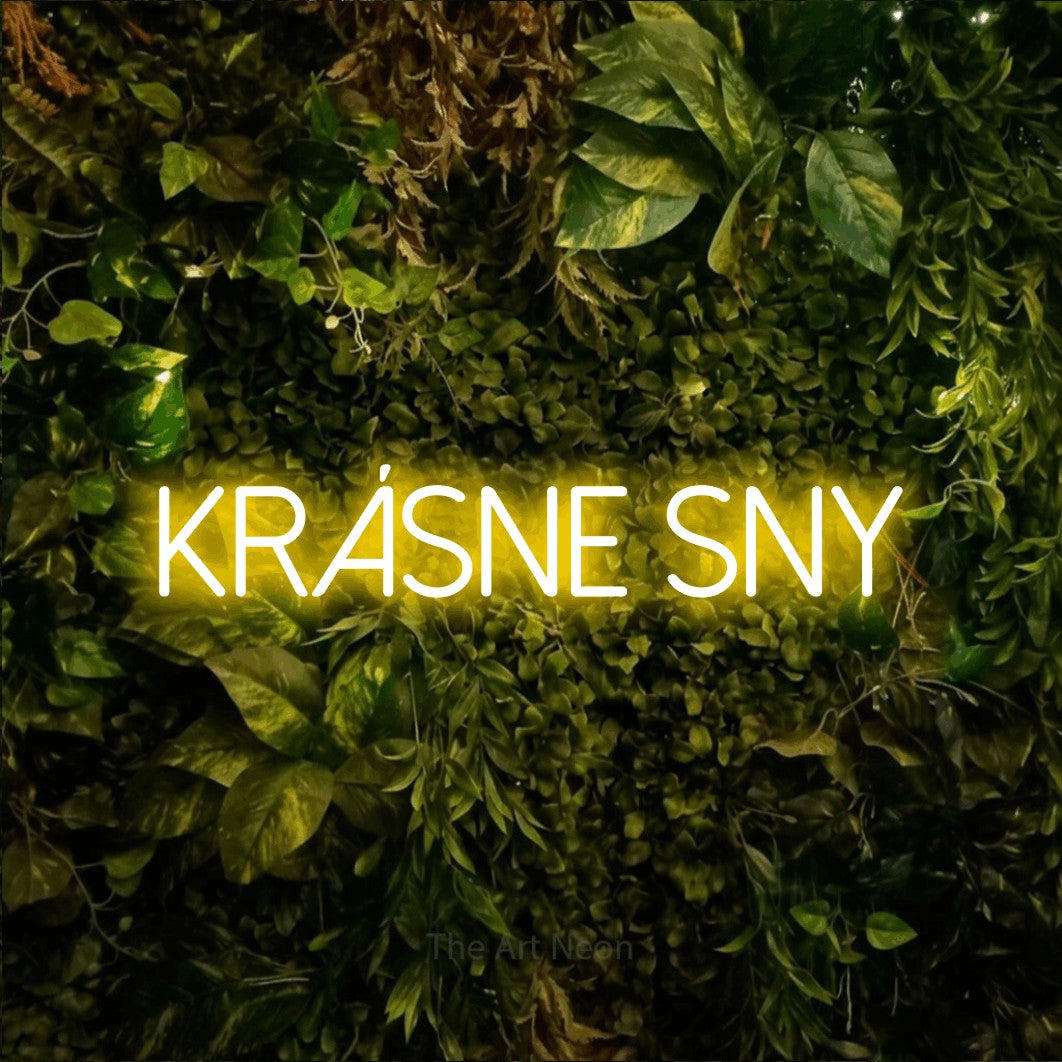 LED neon sign reading “KRÁSNE SNY”, arranged in a single line.
