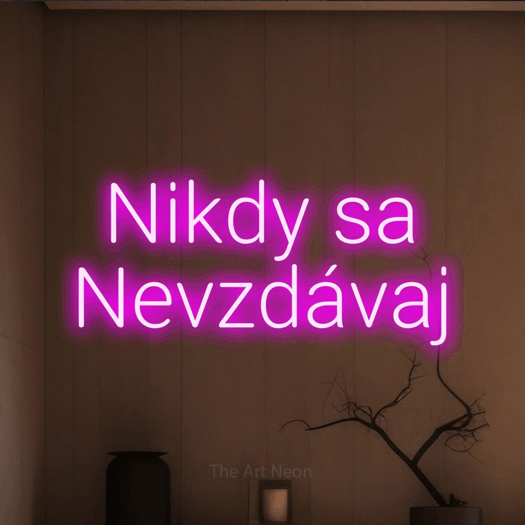 LED neon sign reading “Nikdy sa Nevzdávaj”, arranged in two lines.
