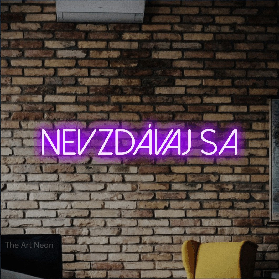 LED neon sign reading “NEVZDÁVAJ SA”, arranged in a single line.