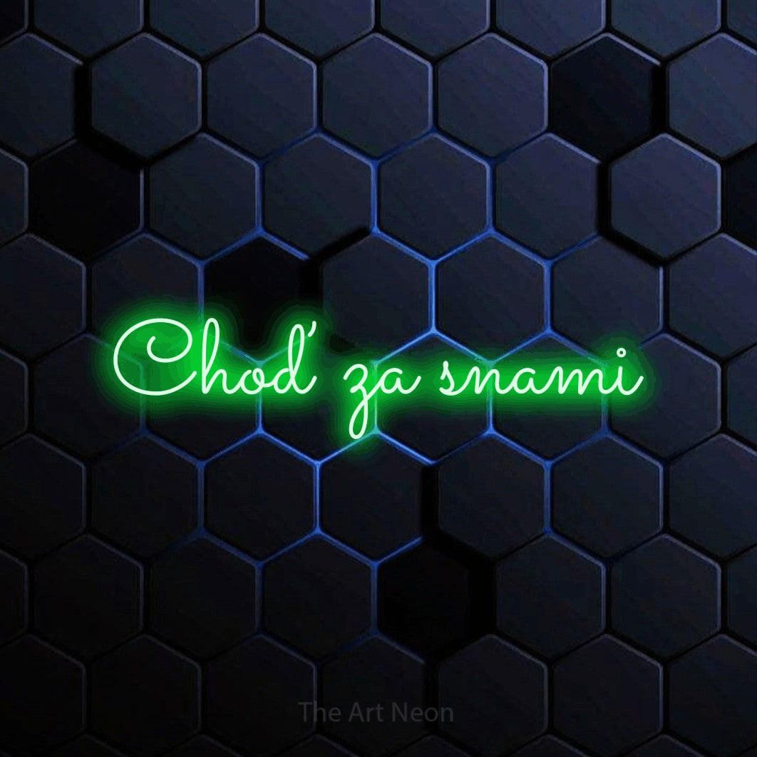 LED neon sign reading “Choď za snami”, arranged in a single line.