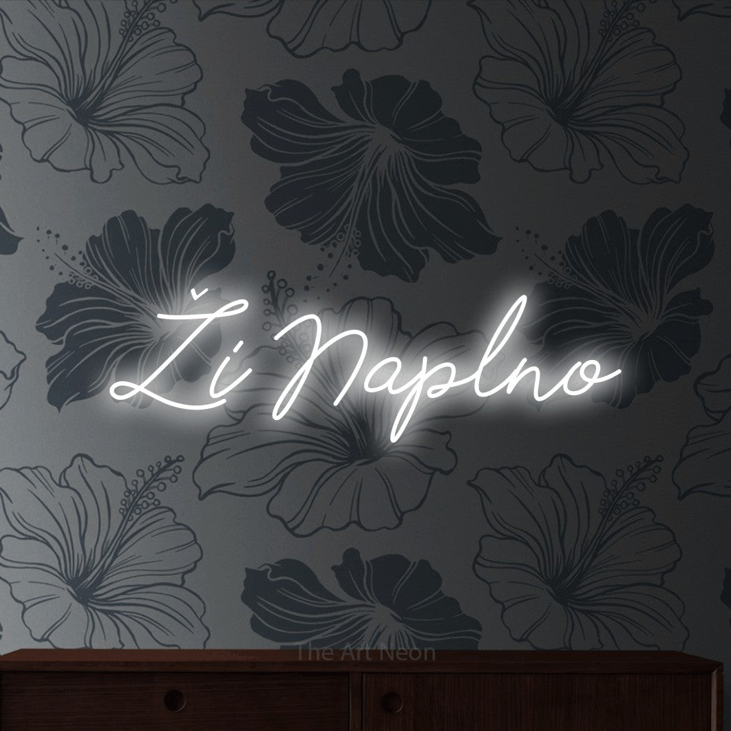 LED neon sign reading “Ži Naplno”, arranged in a single line.