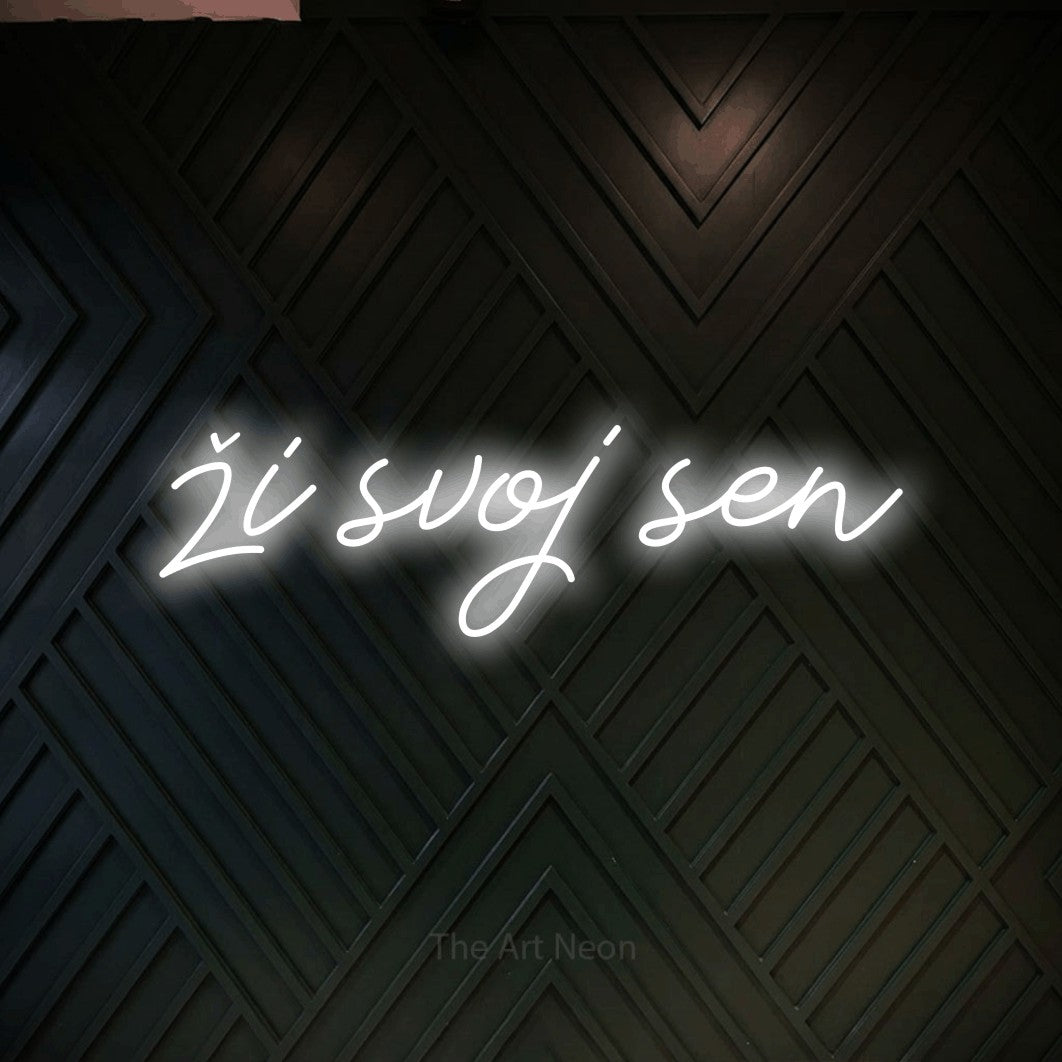 LED neon sign reading “ži svoj sen”, arranged in a single line.
