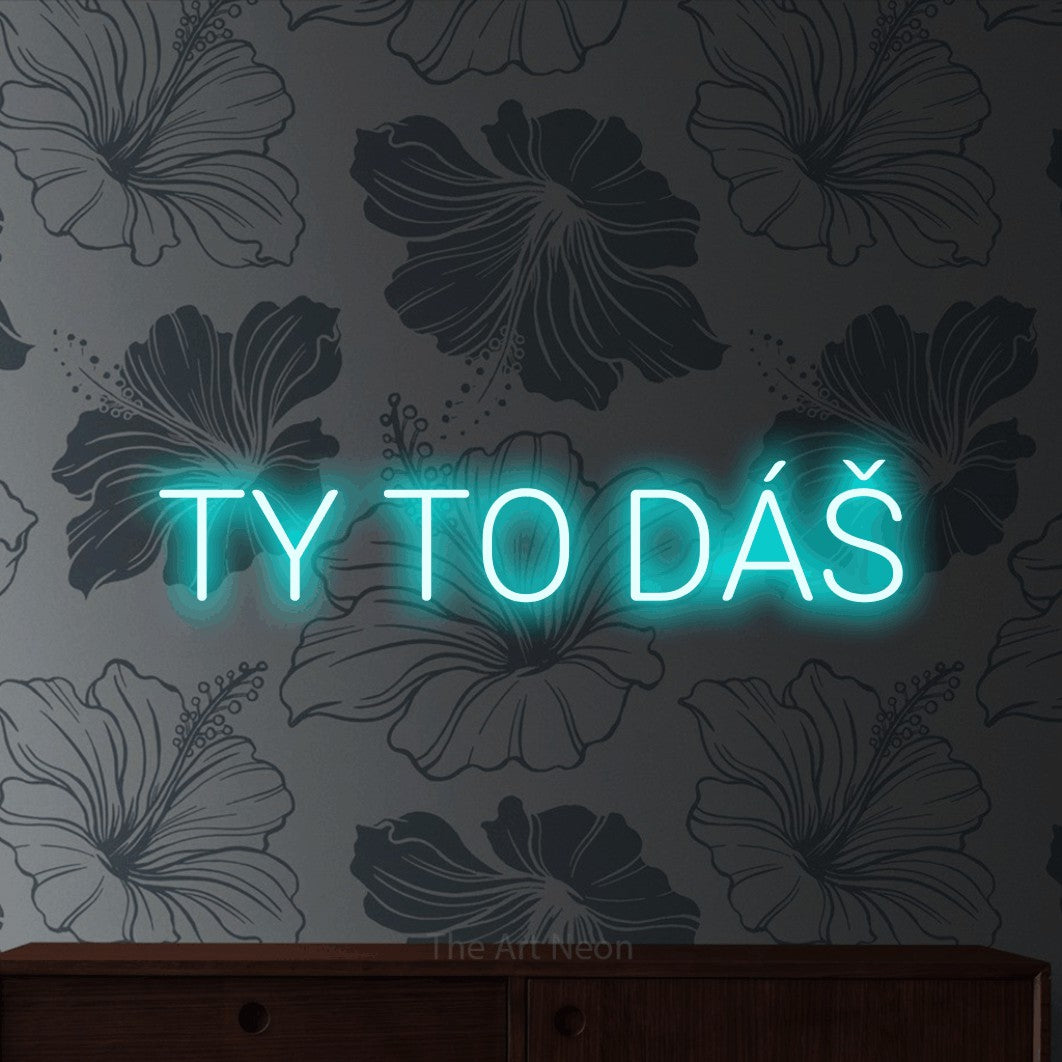 LED neon sign reading “TY TO DÁŠ”, arranged in a single line.