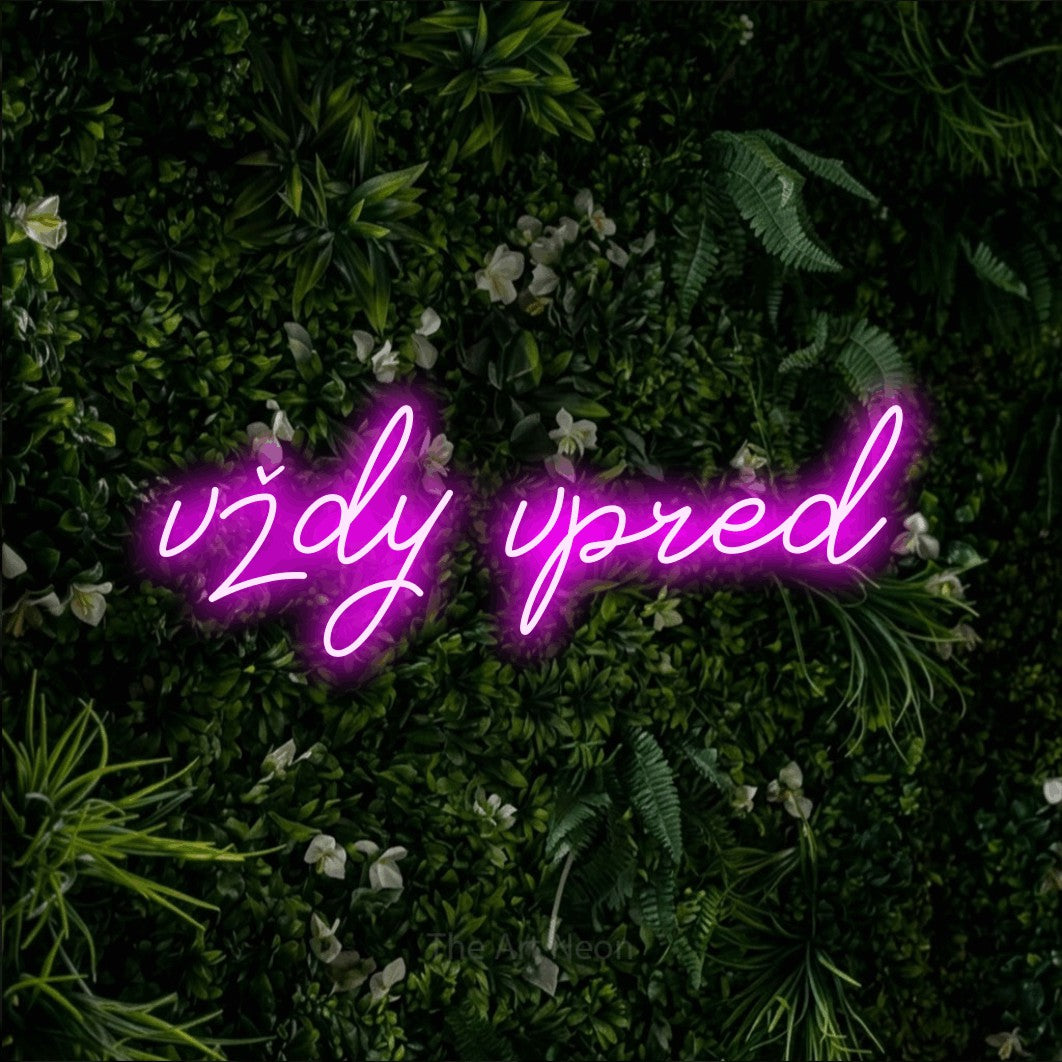 LED neon sign reading “vždy vpred”, arranged in a single line.