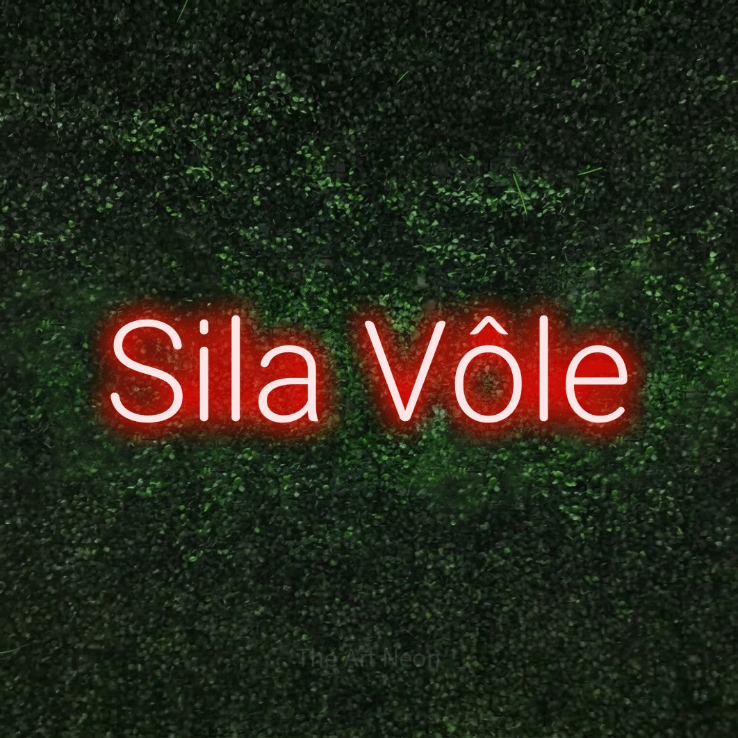LED neon sign reading “Sila Vôle”, arranged in a single line.