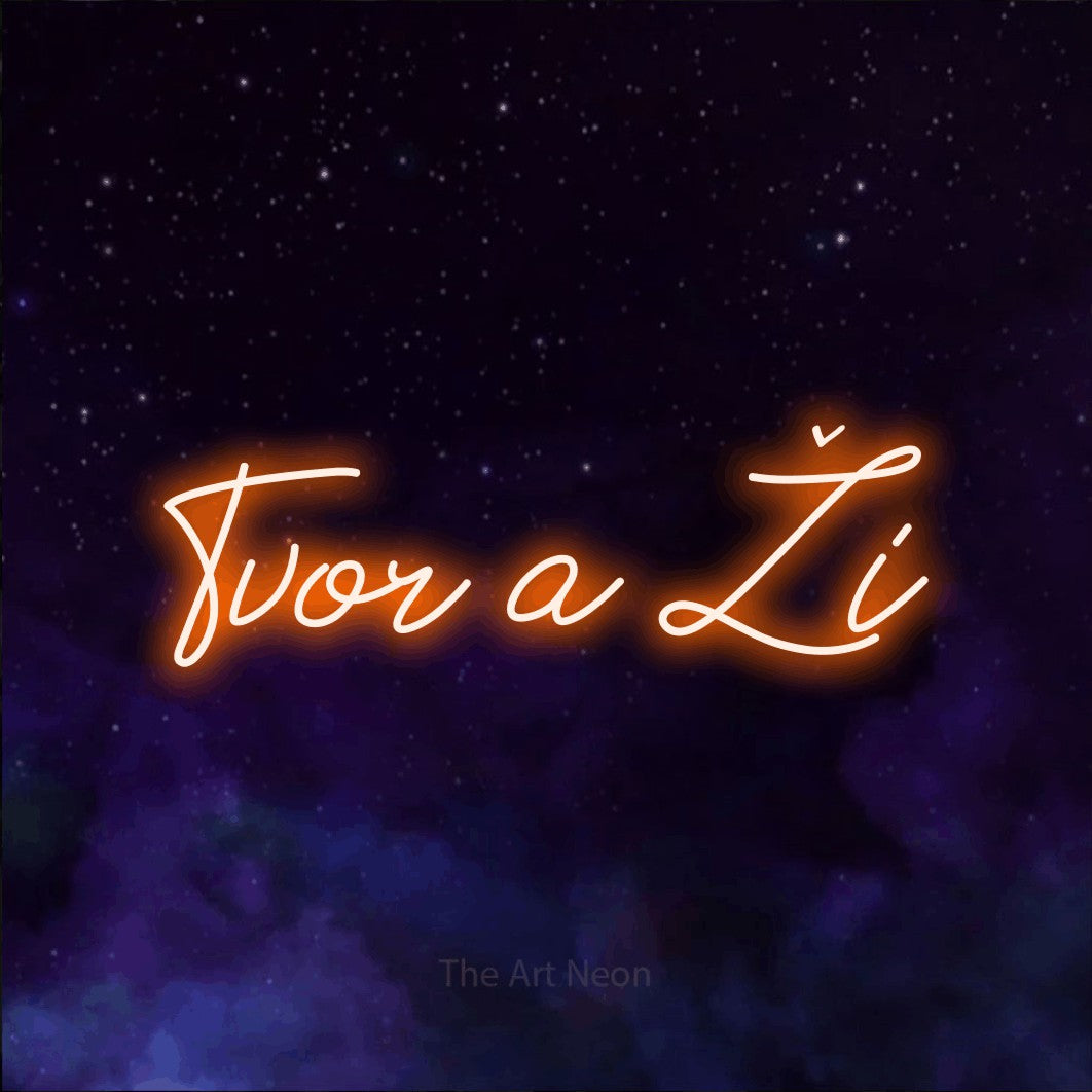 LED neon sign reading “Tvor a Ži”, arranged in a single line.