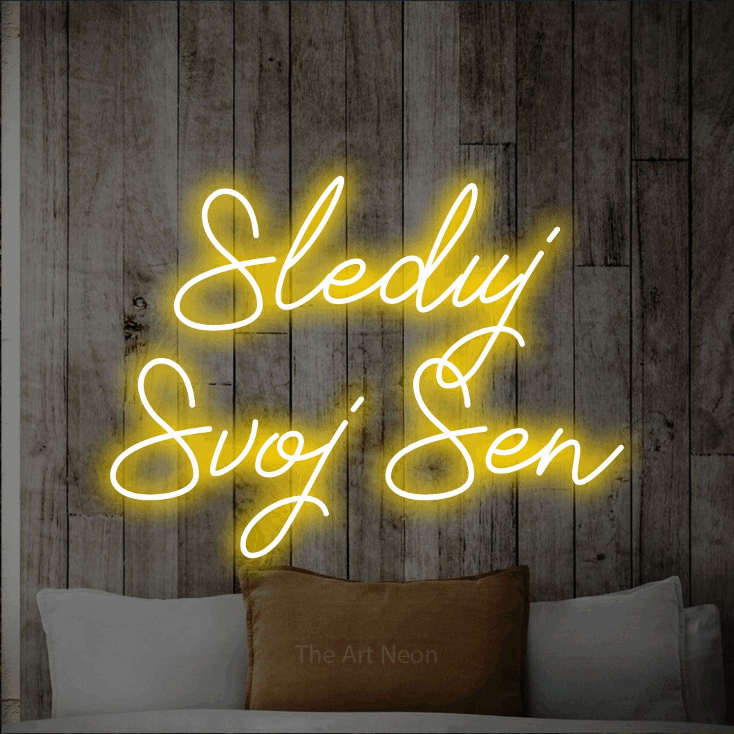 LED neon sign reading “Sleduj Svoj Sen”, arranged in two lines.