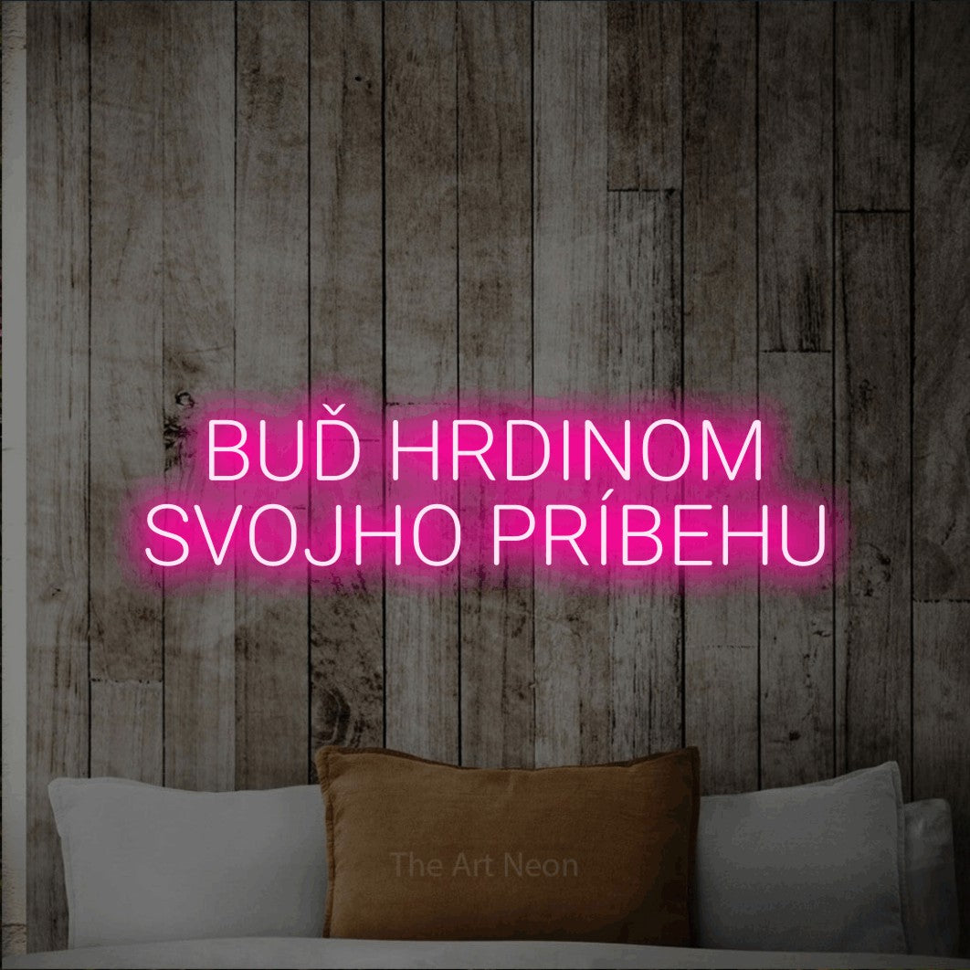 LED neon sign reading “BUĎ HRDINOM SVOJHO PRÍBEHU”, arranged in two lines.