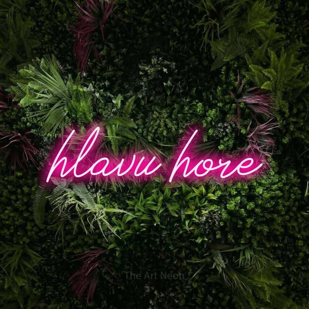 LED neon sign reading “hlavu hore”, arranged in a single line.