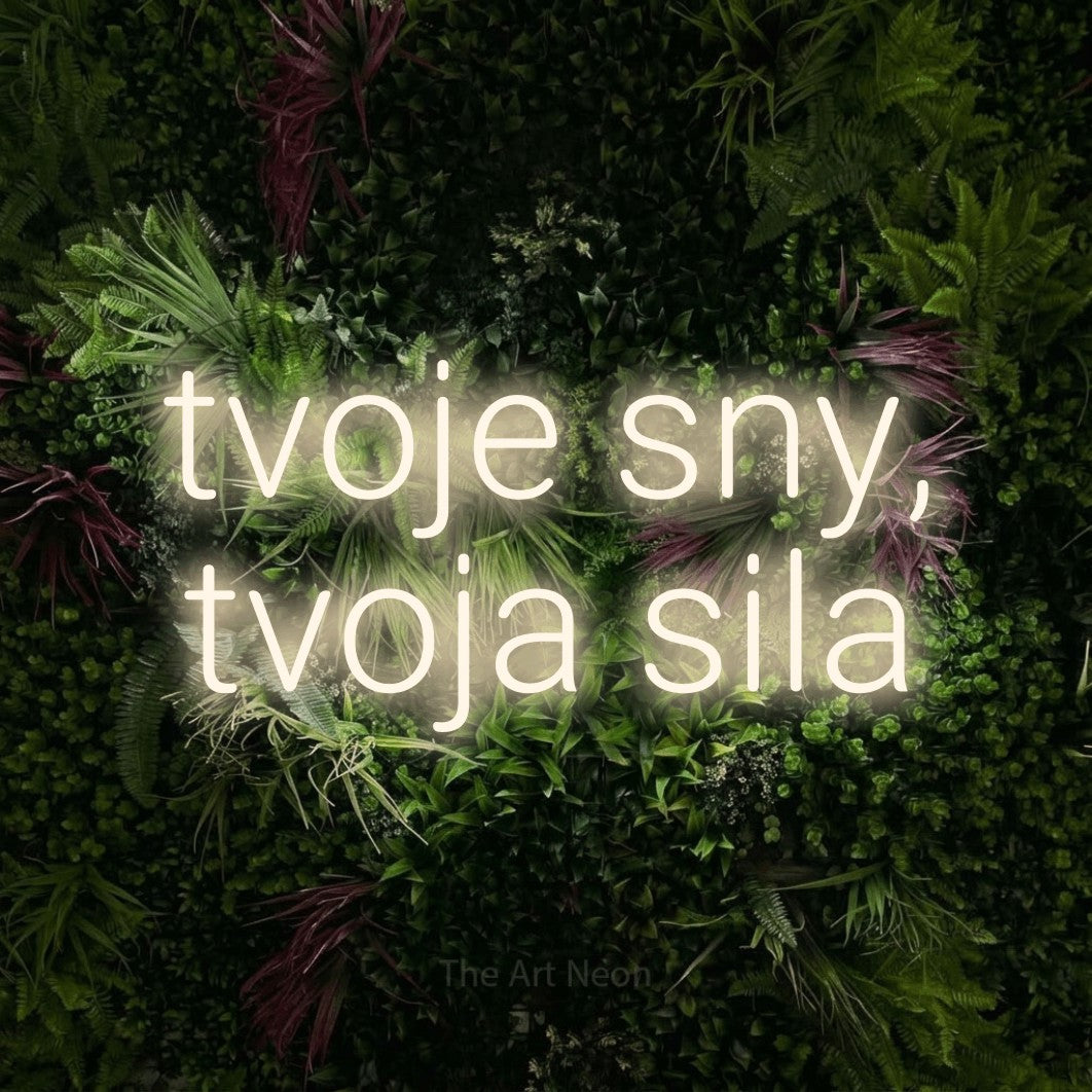 LED neon sign reading “tvoje sny, tvoja sila”, arranged in two lines.