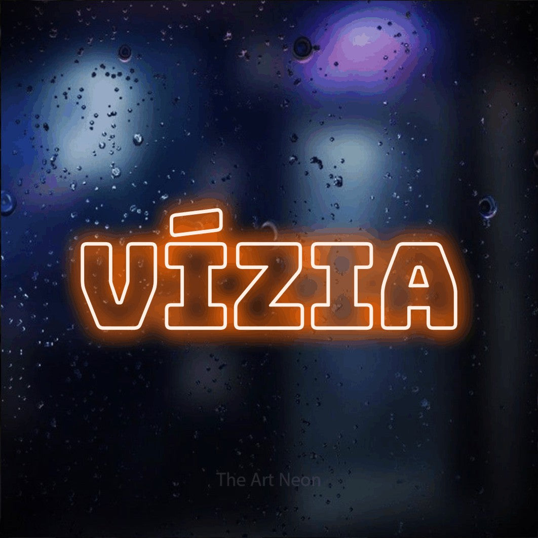 LED neon sign reading “vízia”, arranged in a single line.