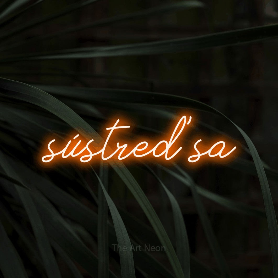 LED neon sign reading “sústreď sa”, arranged in a single line.