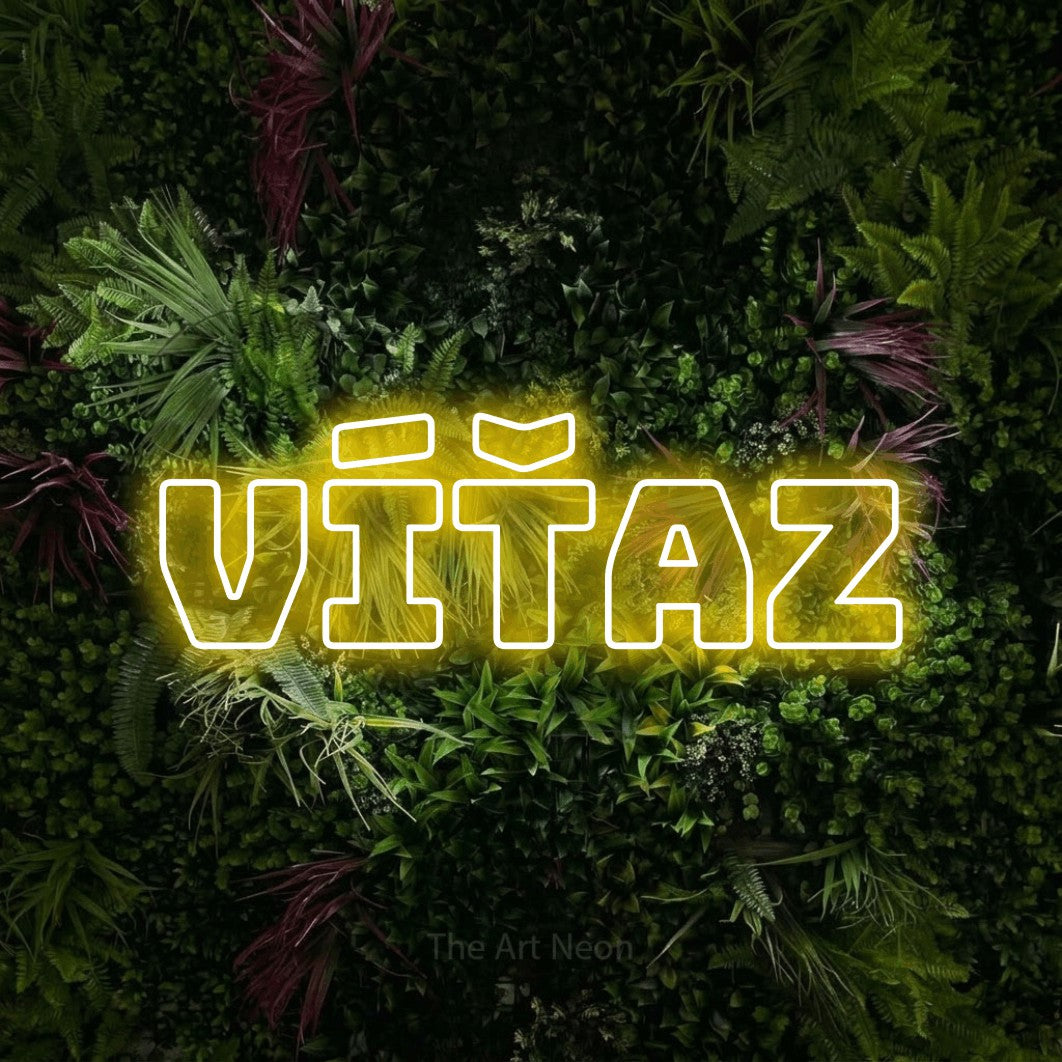 LED neon sign reading “VÍŤAZ”, arranged in a single line.