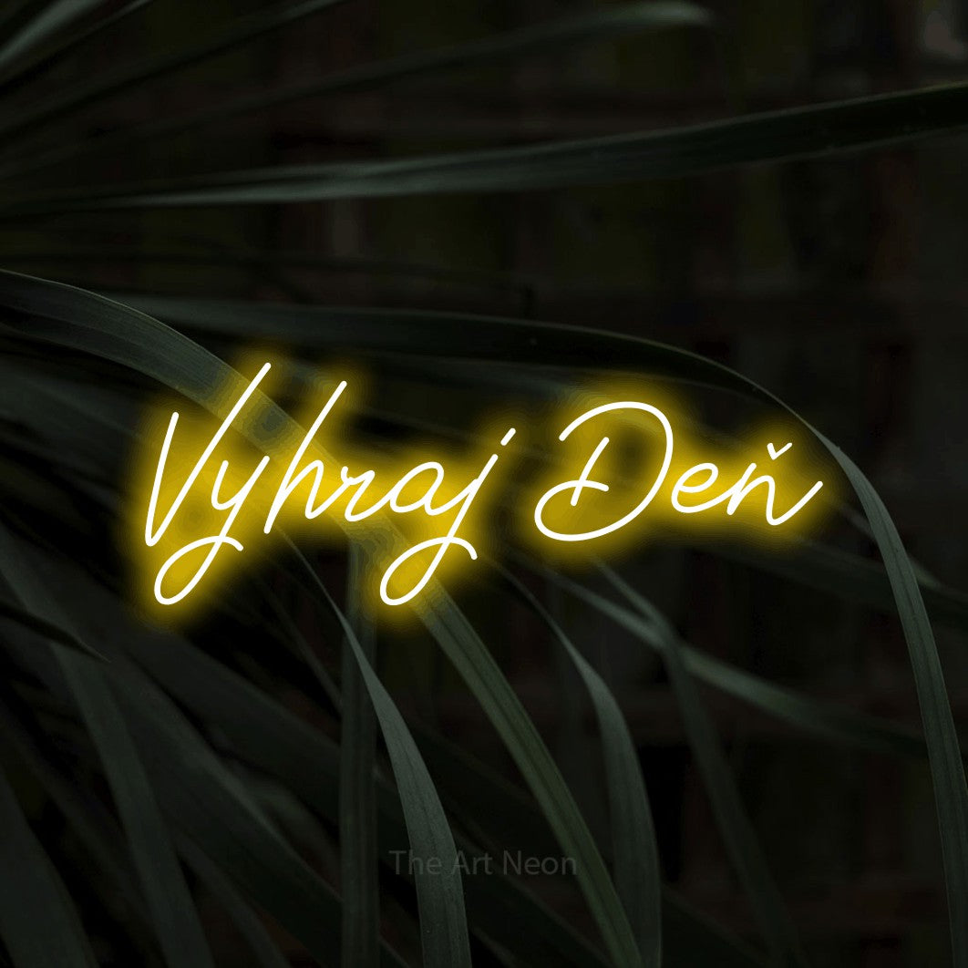 LED neon sign reading “Vyhraj Deň”, arranged in a single line.
