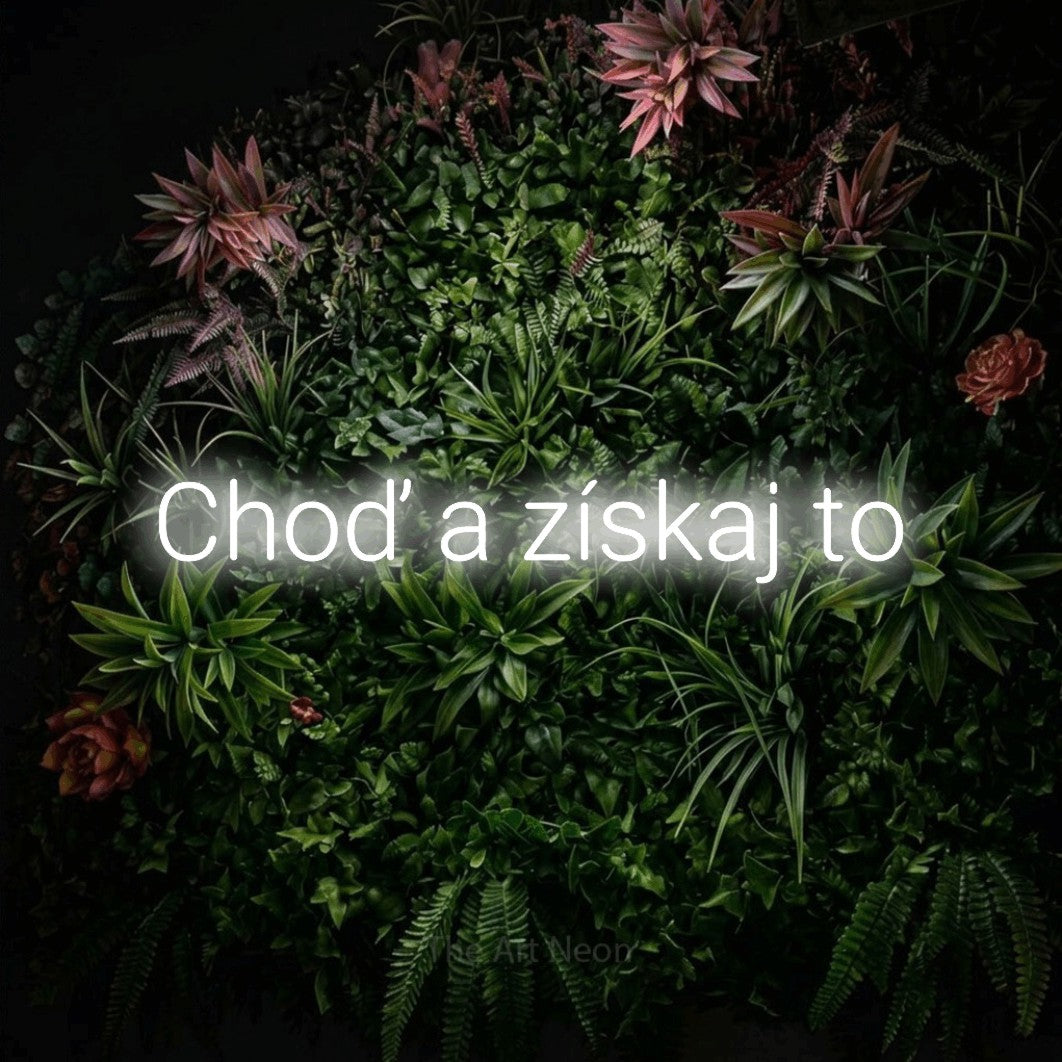LED neon sign reading “Choď a získaj to”, arranged in a single line.