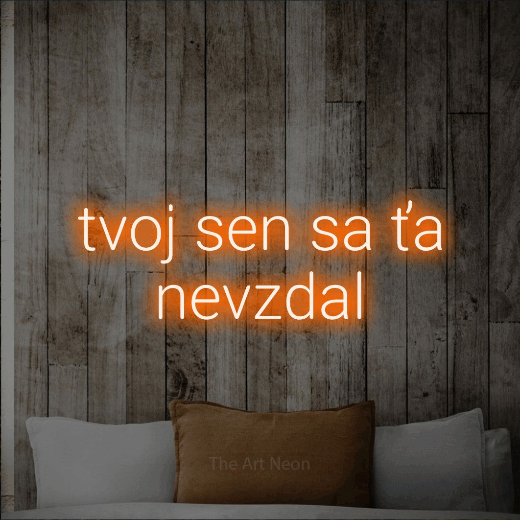 LED neon sign reading “tvoj sen sa ťa nevzdal”, arranged in two lines.