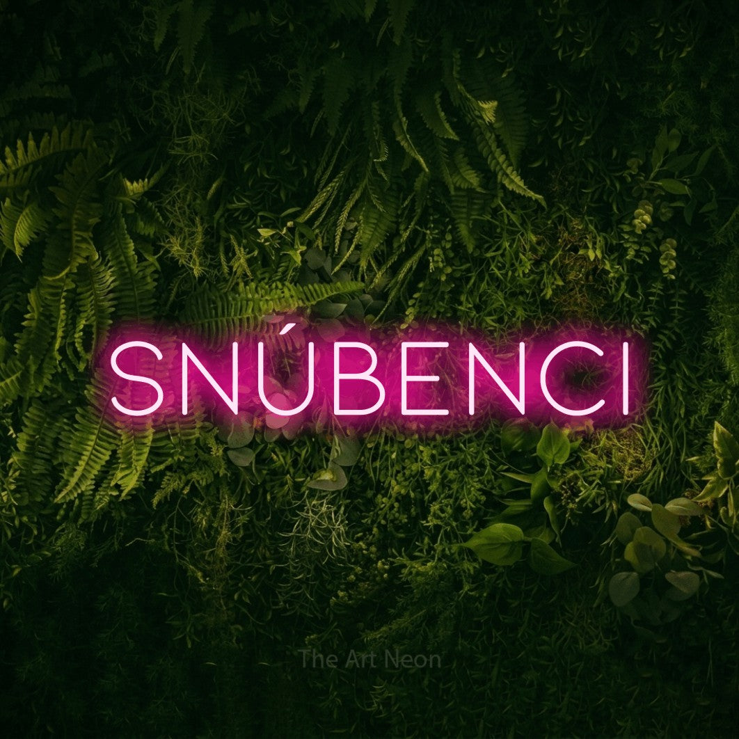 LED neon sign reading “Snúbenci”, arranged in a single line.