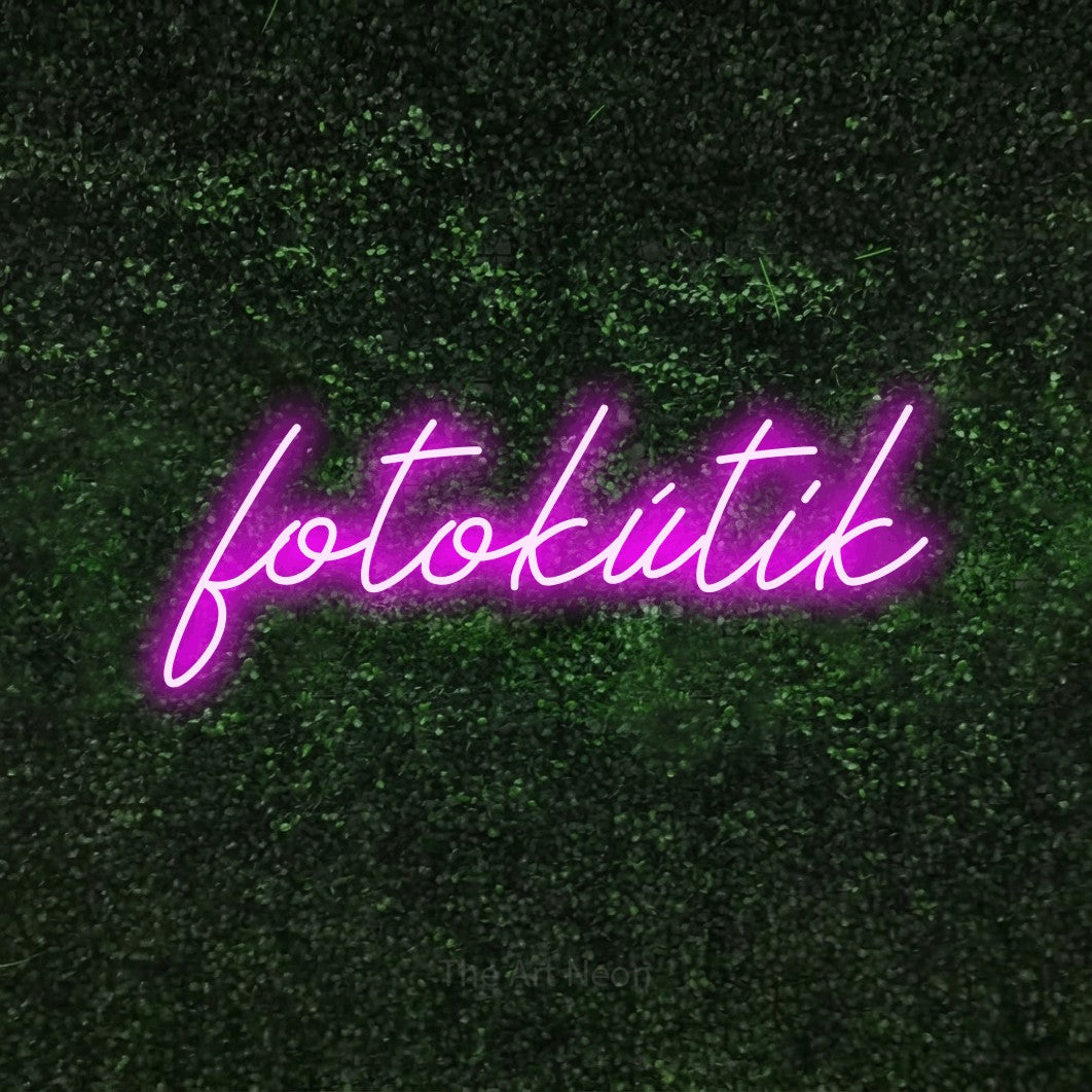 LED neon sign reading “fotokútik”, arranged in a single line.