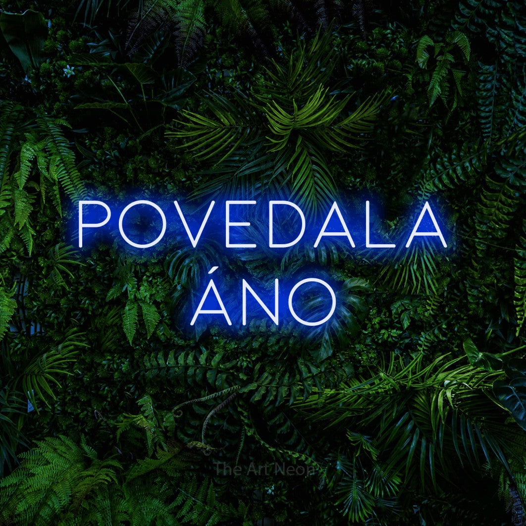 LED neon sign reading “POVEDALA ÁNO”, arranged in two lines.
