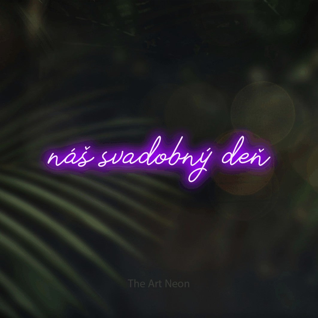LED neon sign reading “náš svadobný deň”, arranged in a single line.