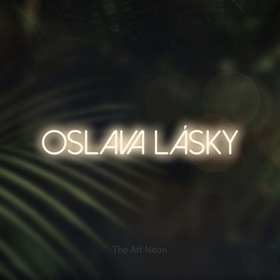 LED neon sign reading “Oslava lásky”, arranged in a single line.