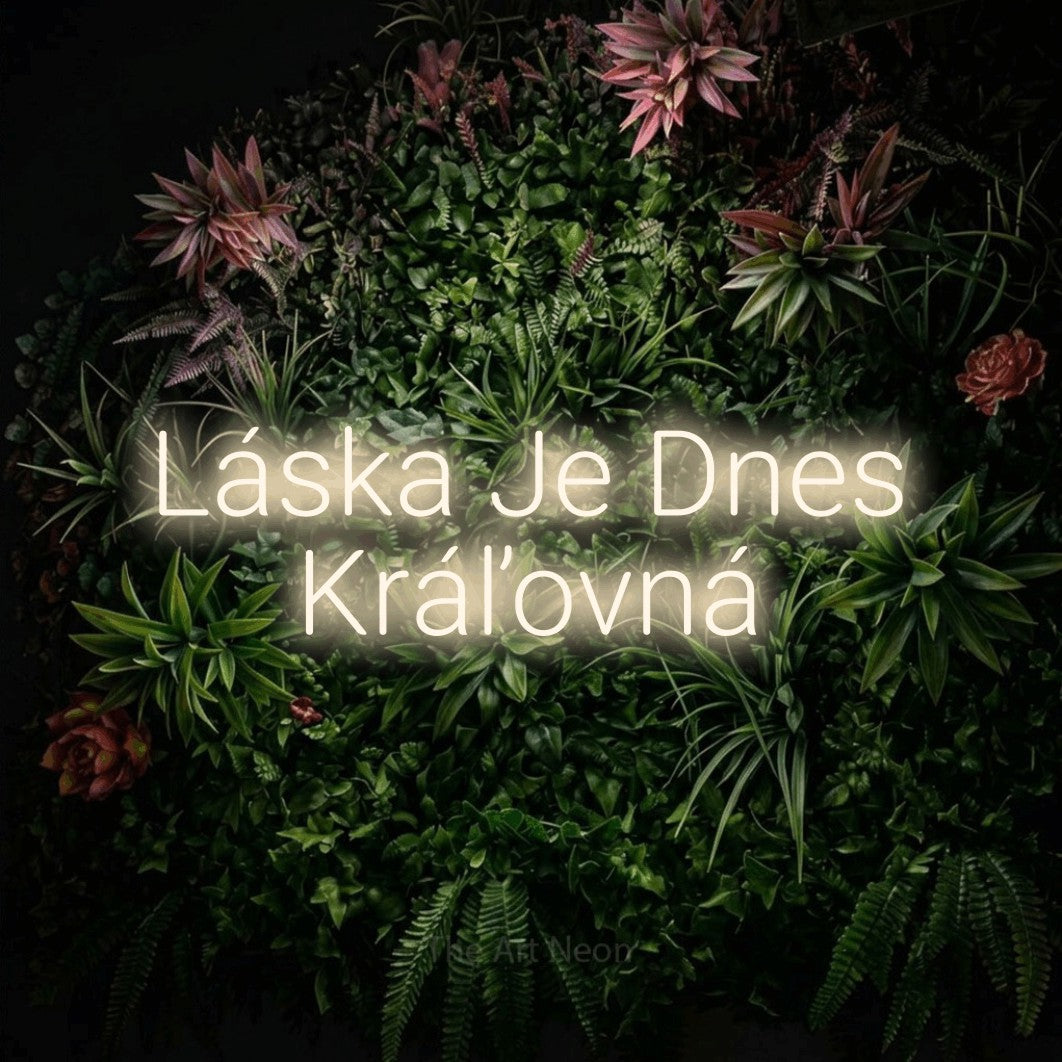 LED neon sign reading “Láska Je Dnes Kráľovná”, arranged in two lines.
