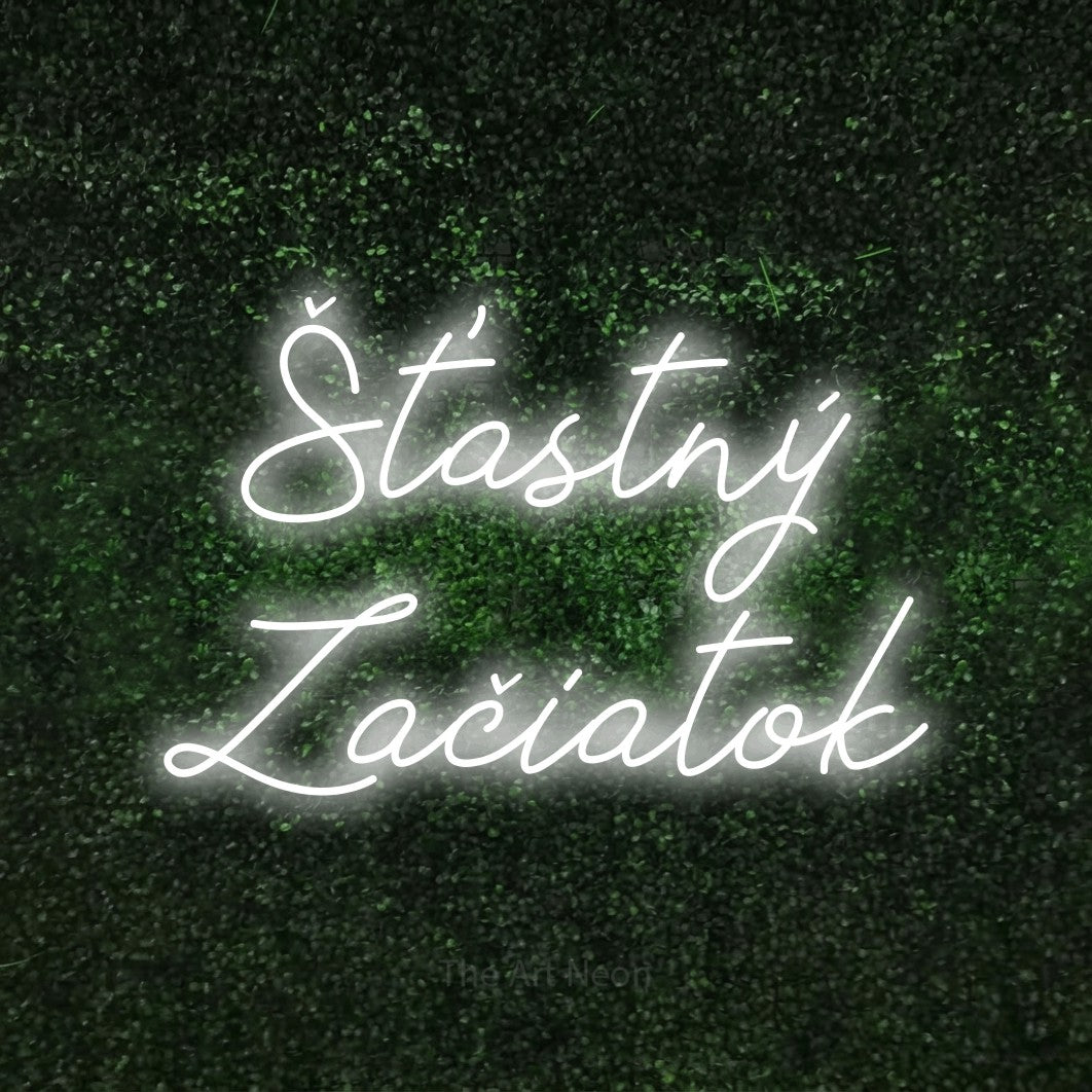 LED neon sign reading “Šťastný Začiatok”, arranged in two lines.