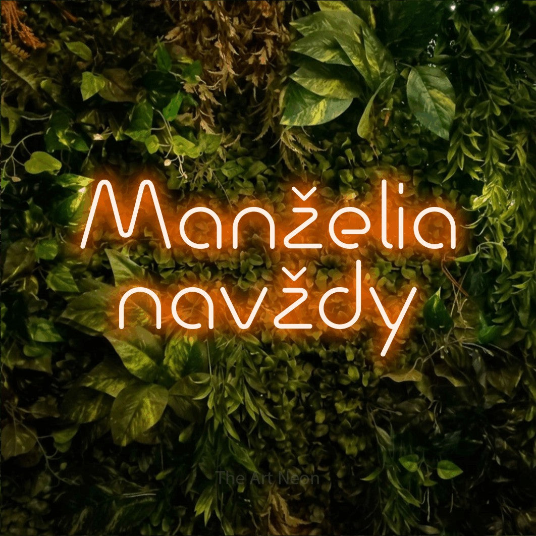 LED neon sign reading “Manželia navždy”, arranged in two lines.