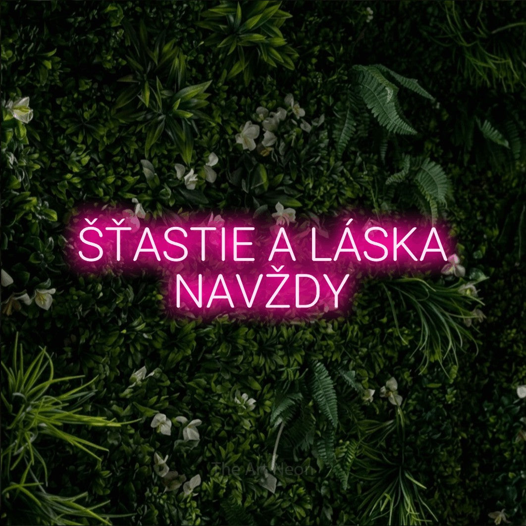 LED neon sign reading “ŠŤASTIE A LÁSKA NAVŽDY”, arranged in two lines.