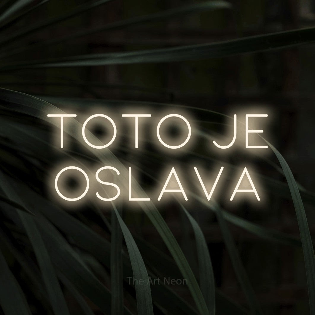 LED neon sign reading “Toto Je Oslava”, arranged in two lines.