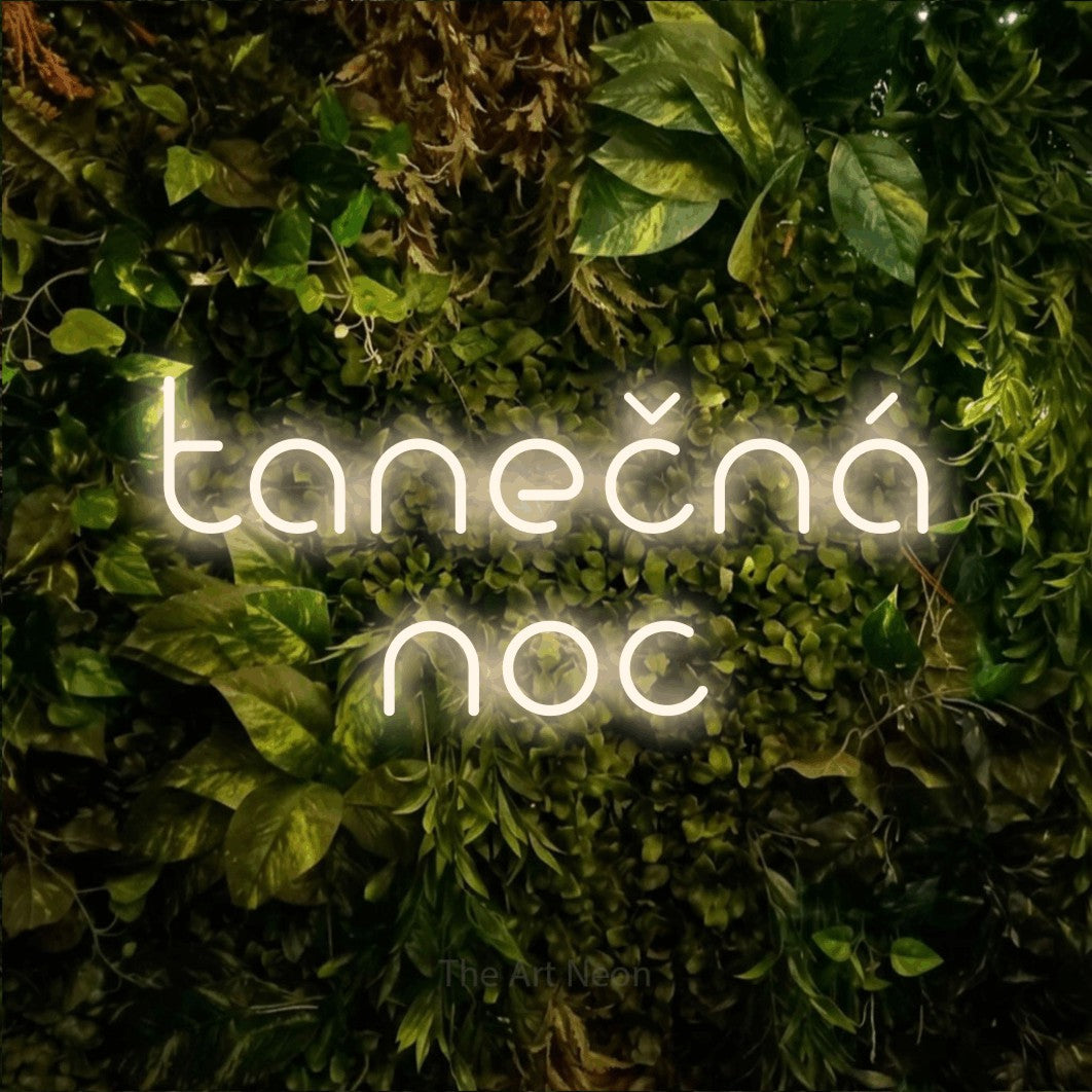 LED neon sign reading “tanečná noc”, arranged in two lines.