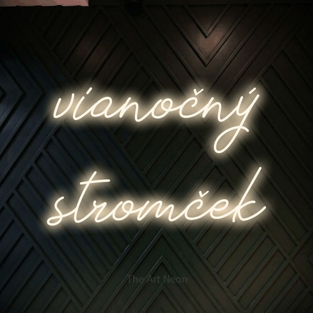 LED neon sign reading “vianočný stromček”, arranged in two lines.