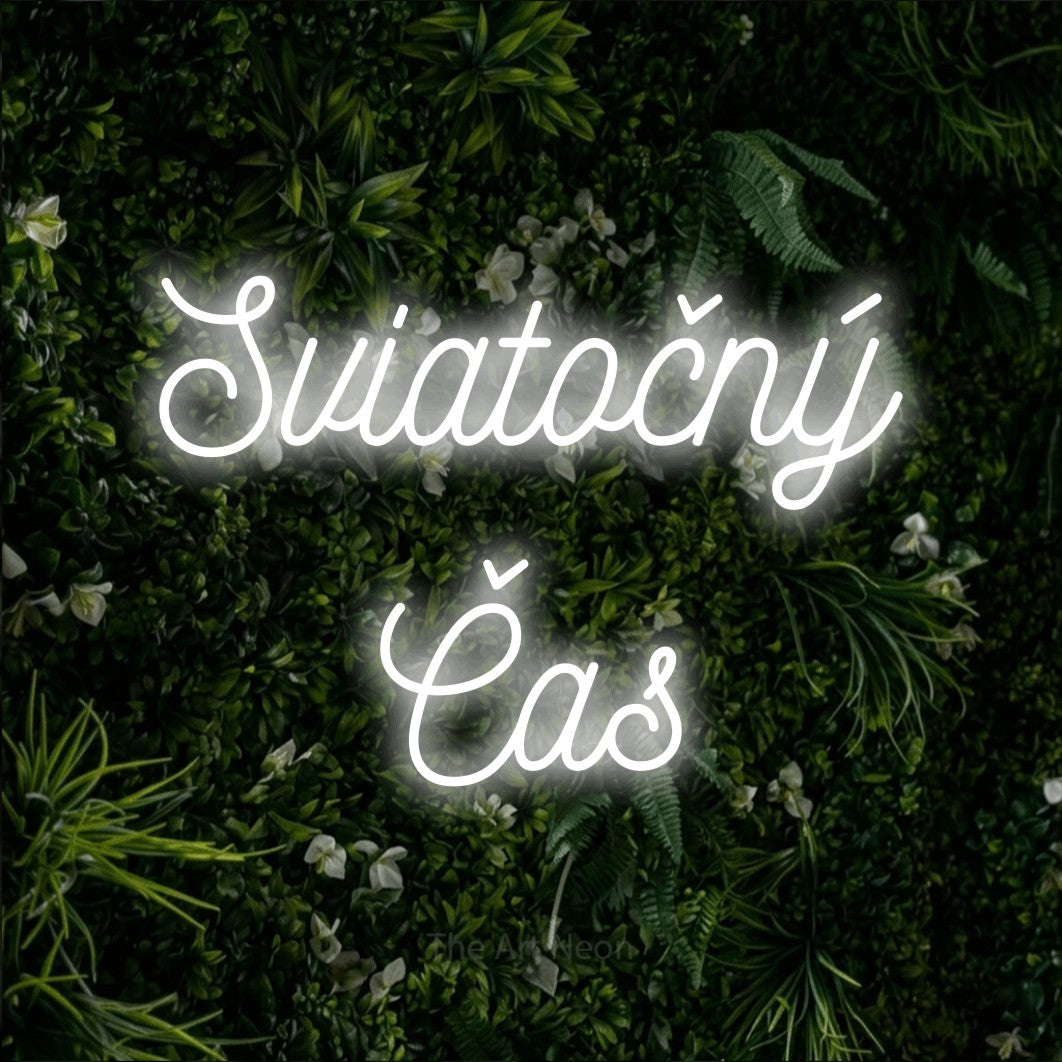 LED neon sign reading “Sviatočný Čas”, arranged in two lines.
